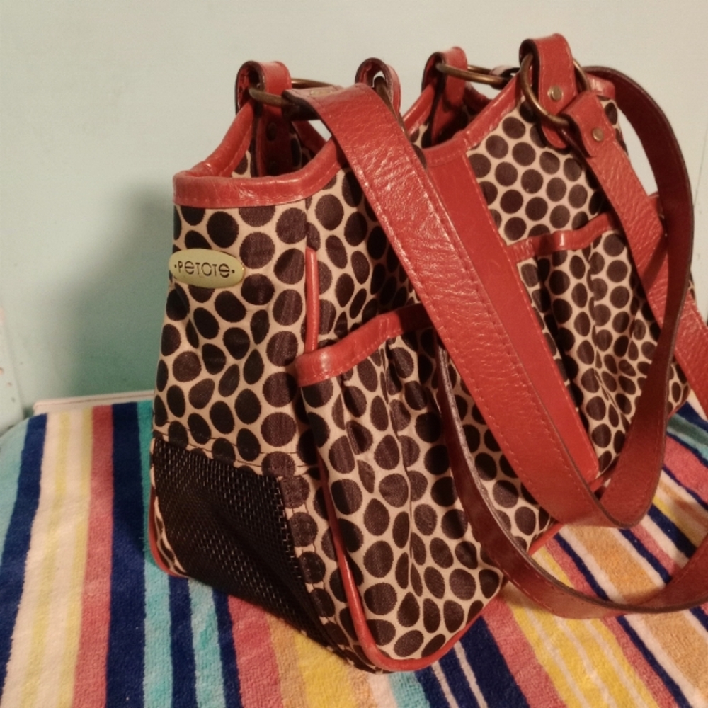 Petote small animal tote designer label 14" wide 8" deep.
